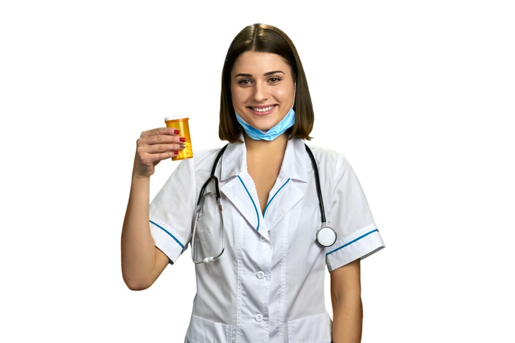 Friendly woman doctor offering pills.